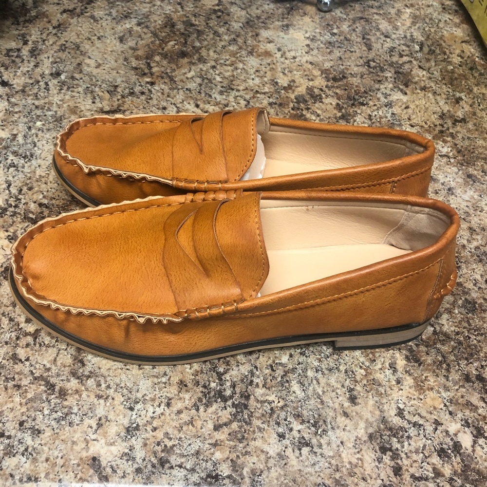 Tan leather shoes (Women’s size 10)